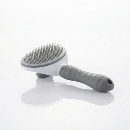 Brosse de toilettage grise pour chats et chiens, picots métalliques doux pour le pelage.